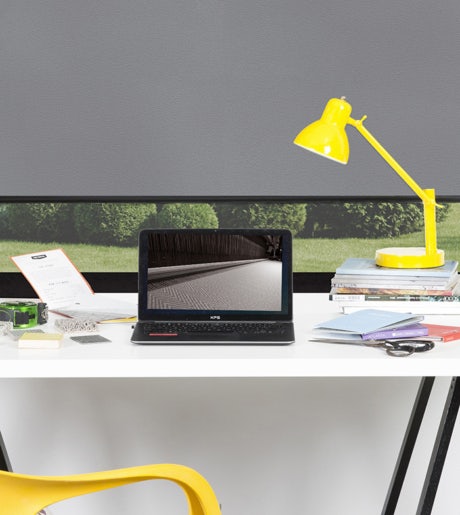 grey blockout roller blinds in modern desk study office scene on white walls