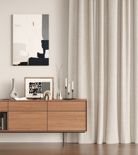 Beige curtain on white wall in home